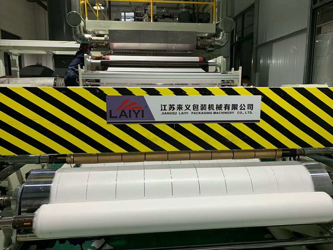 เครื่องเป่าผ้าในแนวดิ่งลงทำให้การรักษาเสถียรภาพของผลิตภัณฑ์คุณภาพขาวและน้ำเงิน 1